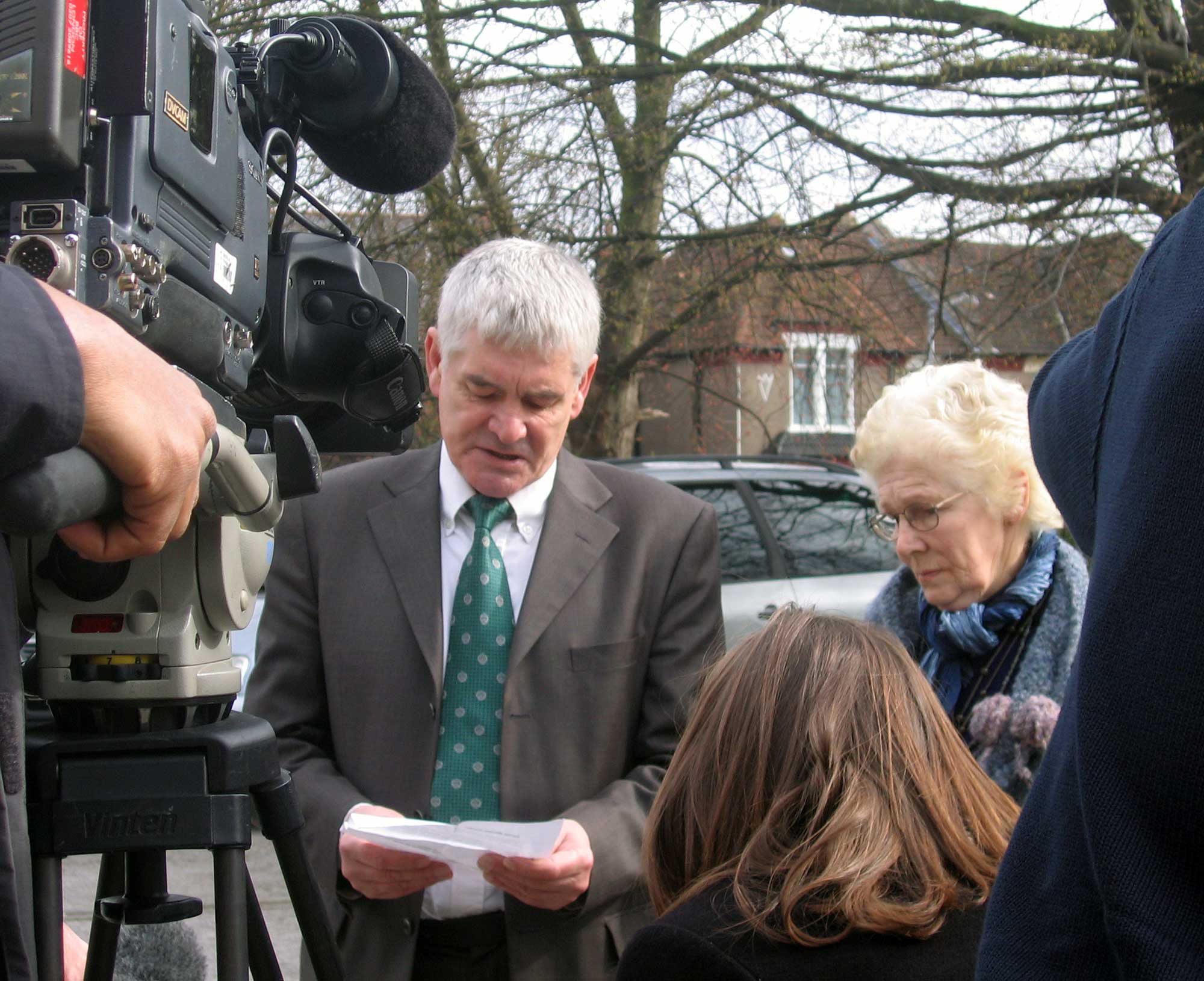 Alastair and his mother give one of many interviews to TV and radio news teams.